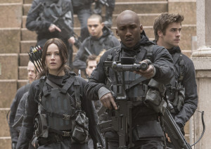 Katniss Everdeen (Jennifer Lawrence, left), Boggs (Mahershala Ali, center) and Gale Hawthorne (Liam Hemsworth, right) work their way into the capitol to find President Snow. Photo Credit: Murray Close