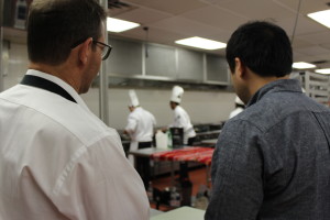 Dallas Chef John Tesar and Austin Chef Paul Qui keep a careful eye on the students. Photo by Bill Orcutt