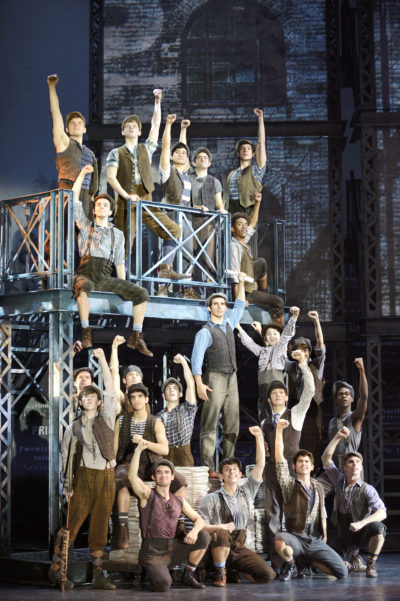Joey Barreiro (Jack Kelly) (center) and the North American Tour company of Disney’s NEWSIES. Photo by Deen van Meer