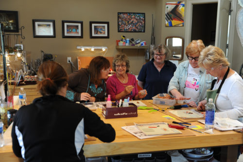 These women were taking a glass fusing class during a previous outing.