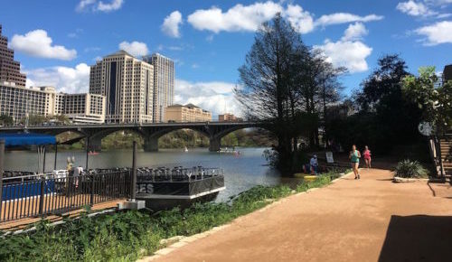 Use hiking and bike trails around Lady Bird Lake and the pedestrian bridge at Congress Ave. to go between the Four Seasons and Hyatt hotels. Photo by Leah Nyfeler