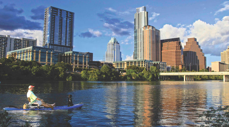 Austin Skyline with kayaker dog e1524564679625